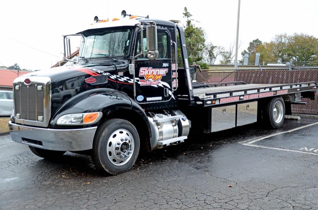 Skinner Body Shop flatbed wrecker